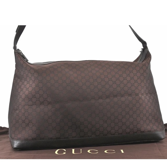 Gucci Handbags - Authentic Gucci brown monogram canvas XL unisex travel bag Weekender